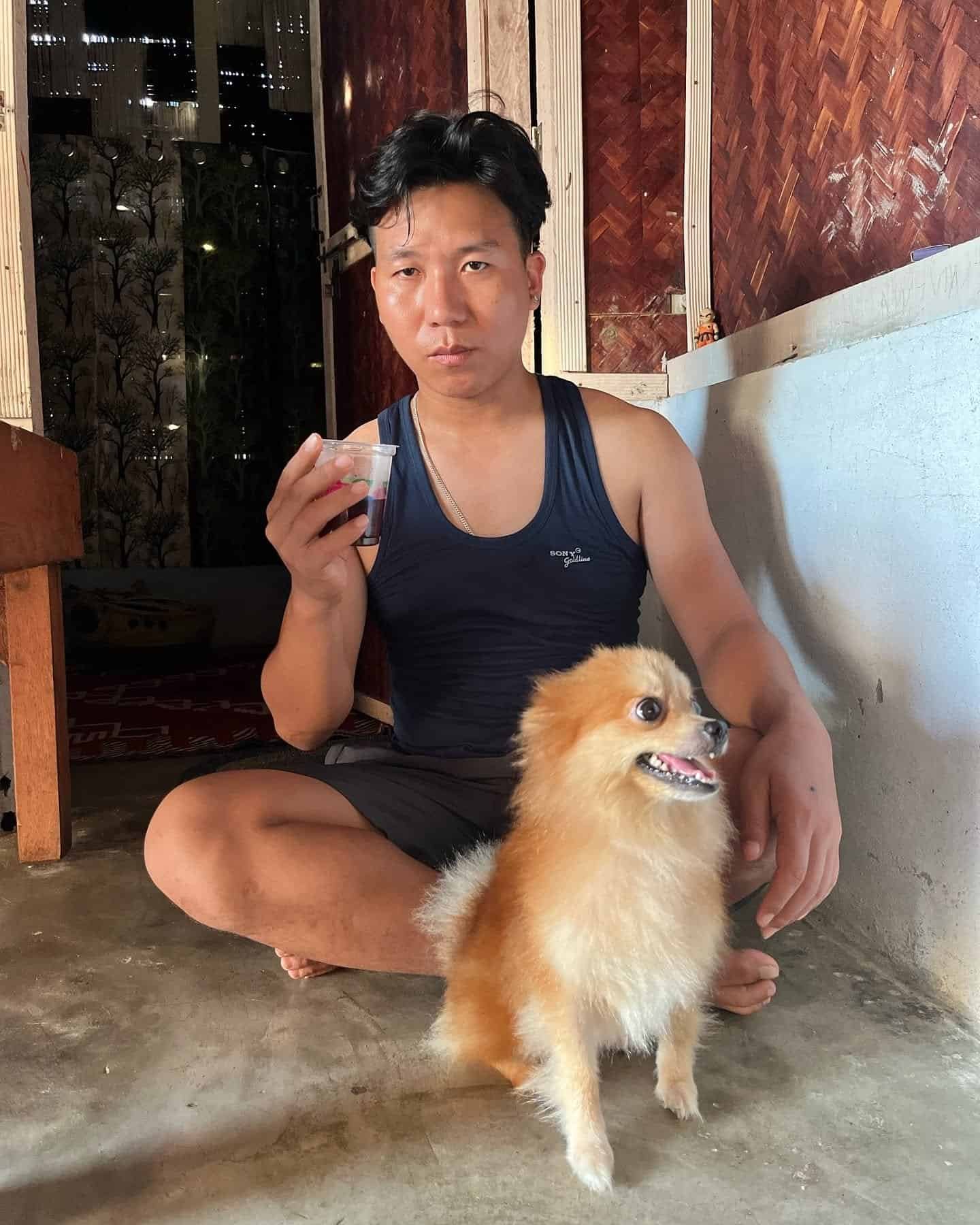 James Libang with his pet dog